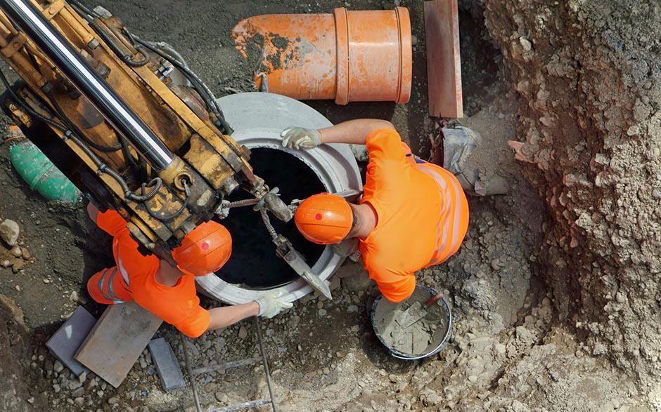 travaux assainissement prix Versailles